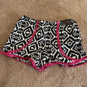 Brand new shorts, great to wear over bathing suit!